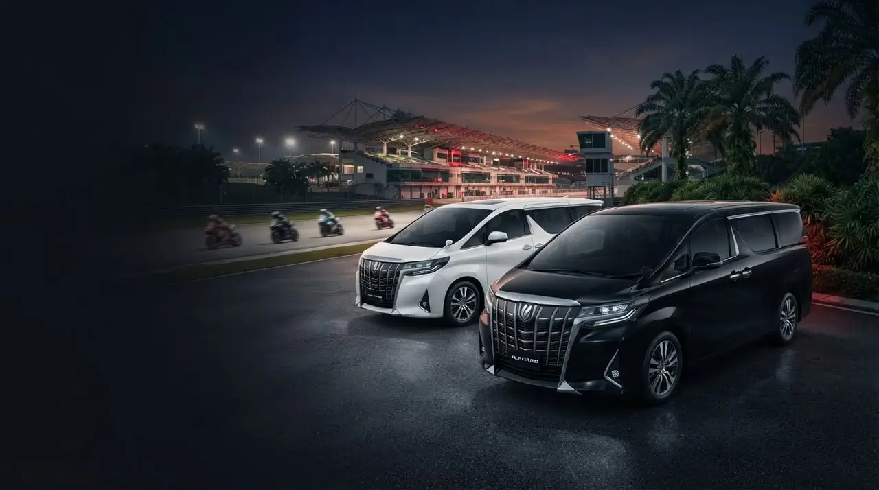 Black and white private chauffeur vehicles at Sepang International Circuit for MotoGP Malaysia 2026