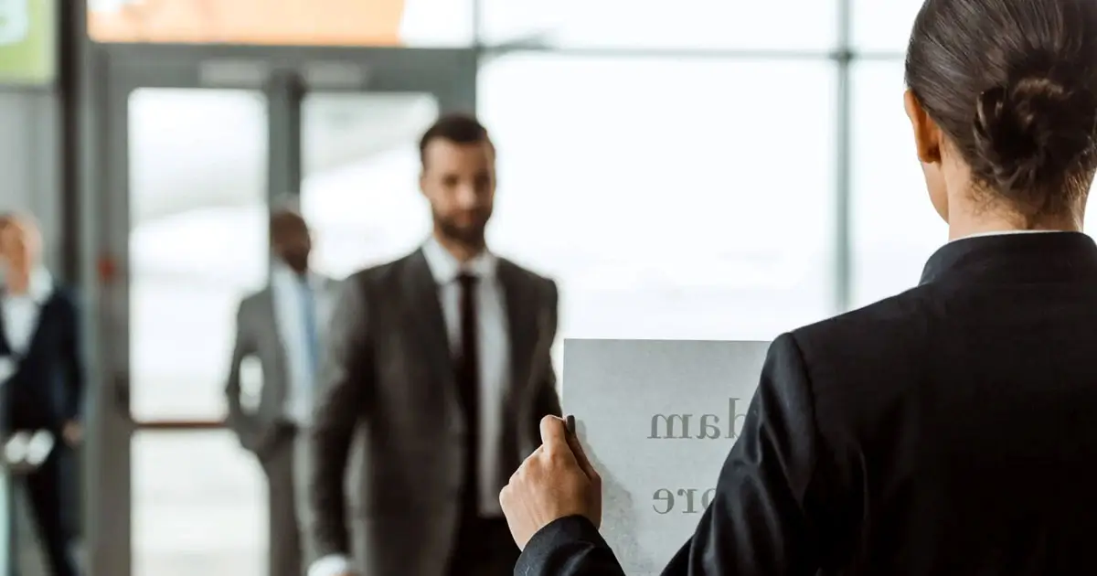 Arrival placard name sign at airport arrivals for meet and greet service
