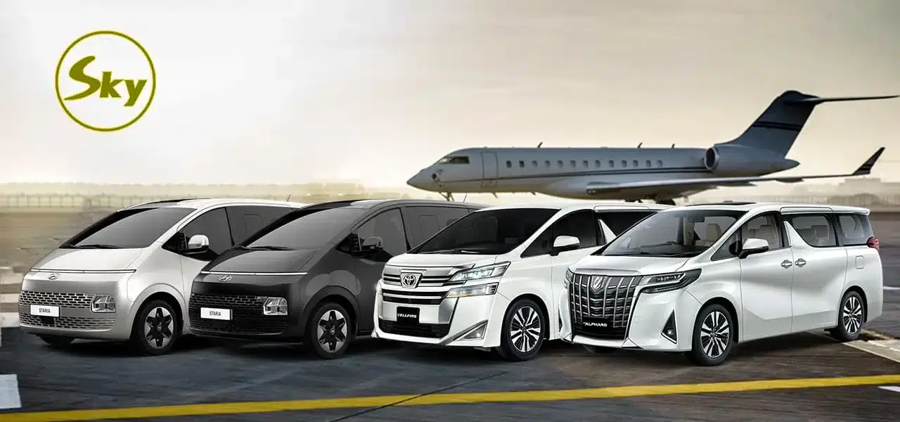 Black Toyota Alphard luxury MPV parked in Kuala Lumpur city street for executive chauffeur service